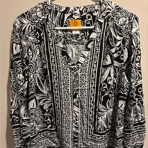 Size M women’s NWT blouse.